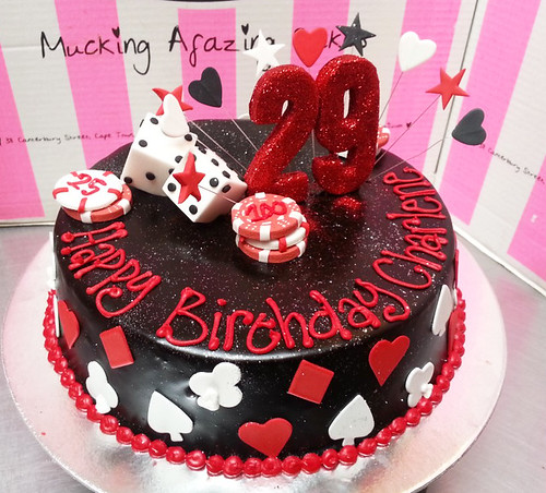 Wicked chocolate iced in black ganache, fondant card suits, 3D fondant dices, chips and red glittered 3D#29