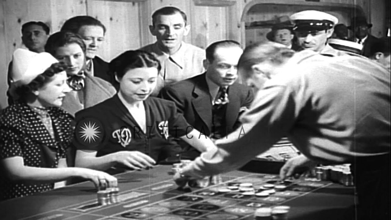 Passengers play Online Casino Australian Roulette game aboard a gambling ship underway off the coas…HD Stock Footage